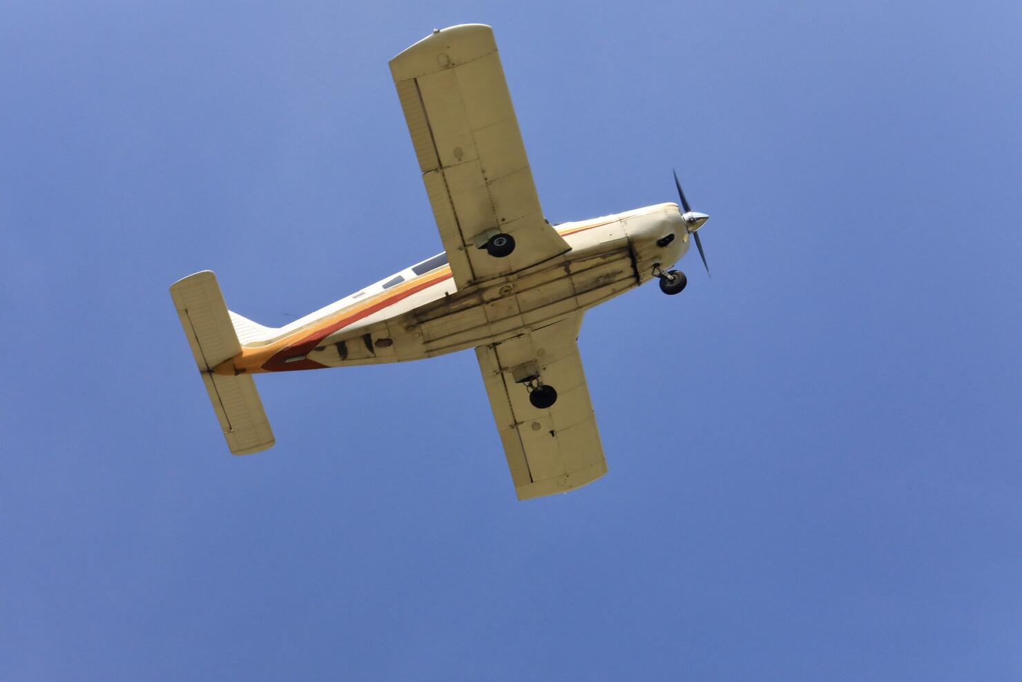 Low angle view of a small aircraft in the sky