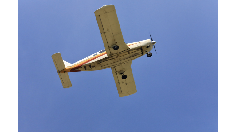 Low angle view of a small aircraft in the sky