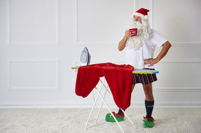 Santa claus having a coffee break