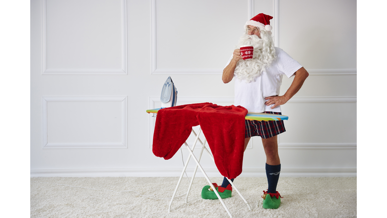 Santa claus having a coffee break