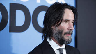 WATCH: Crazy Fan Rushes Keanu Reeves Claiming She's His "Divine Wife"