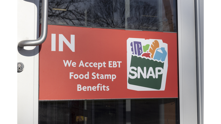 SNAP and EBT Accepted here sign. SNAP and Food Stamps provide nutrition benefits to supplement the budgets of disadvantaged families.