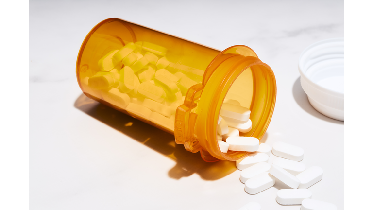 Pills spilled from a prescription bottle