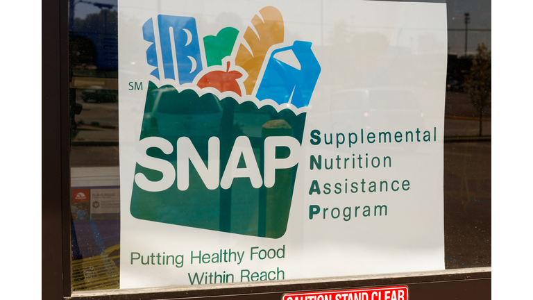 A Sign at a Retailer - We Accept SNAP IV