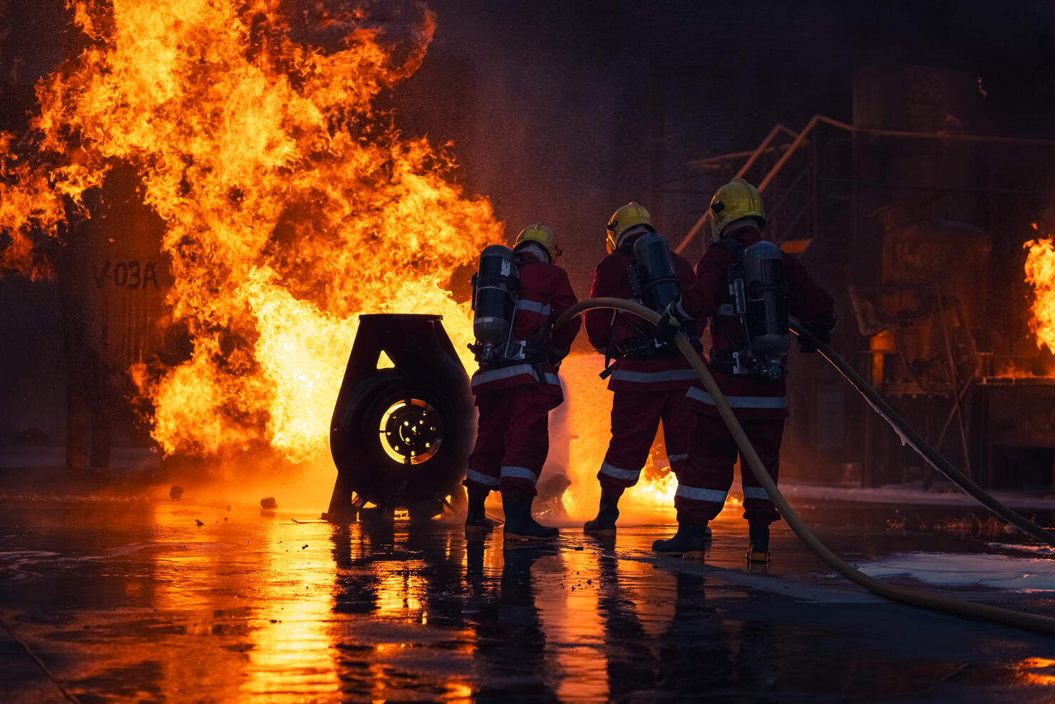 Firefighters' nighttime fire suppression training by simulating fire control in industrial plants with gas pipelines or oil pipelines, conducted by a teamwork.