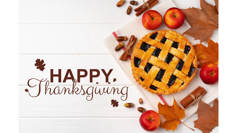 Celebrating Thanksgiving with a festive pie and seasonal decorations on a cozy table