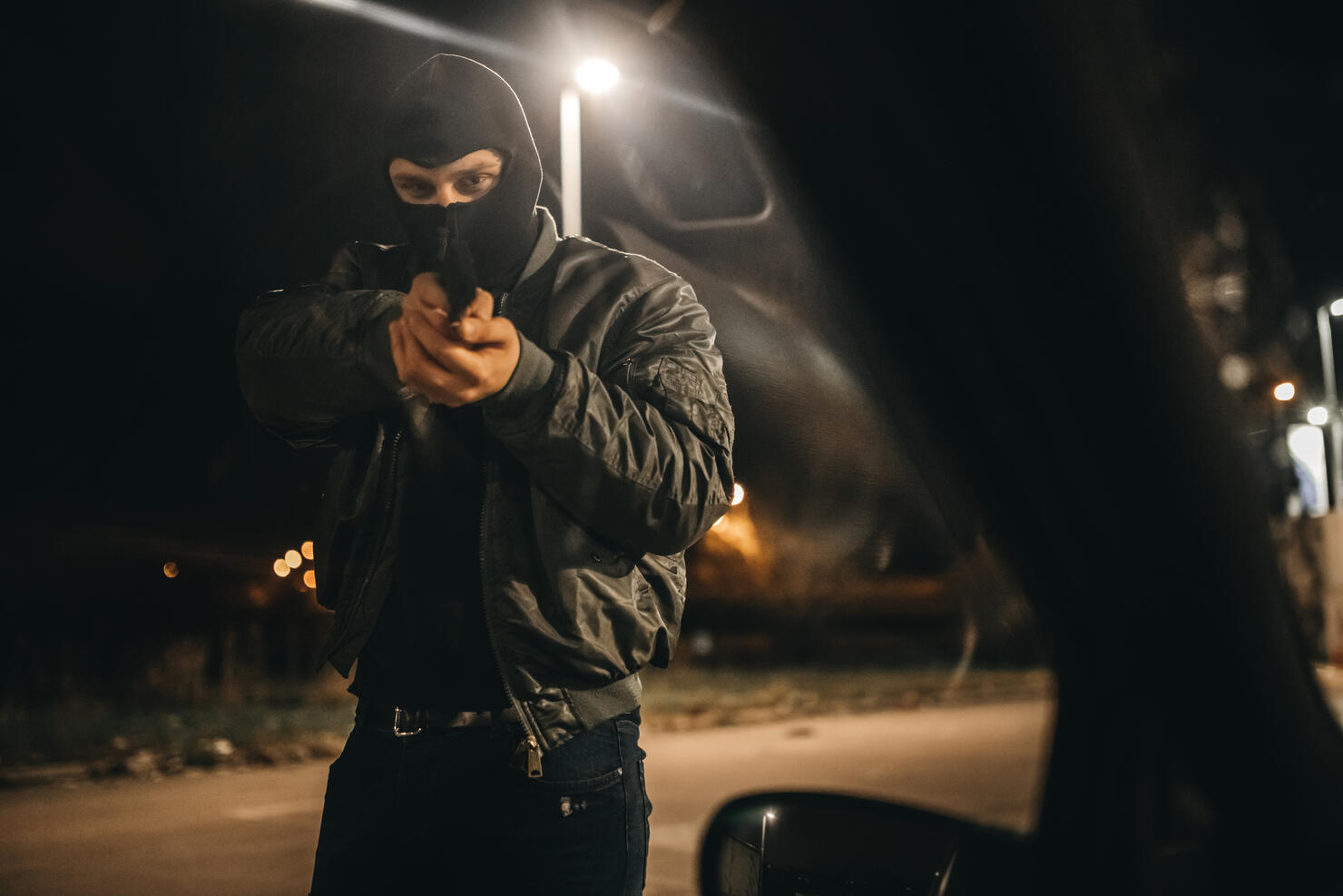 Holding you at a gunpoint