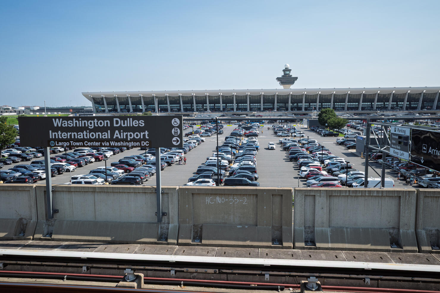 Washington Dulles International Airport with passenger terminal and parking, Virginia