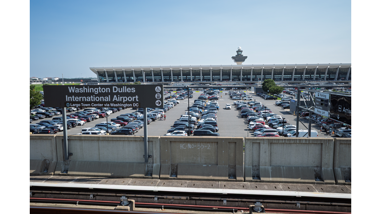 Washington Dulles International Airport with passenger terminal and parking, Virginia