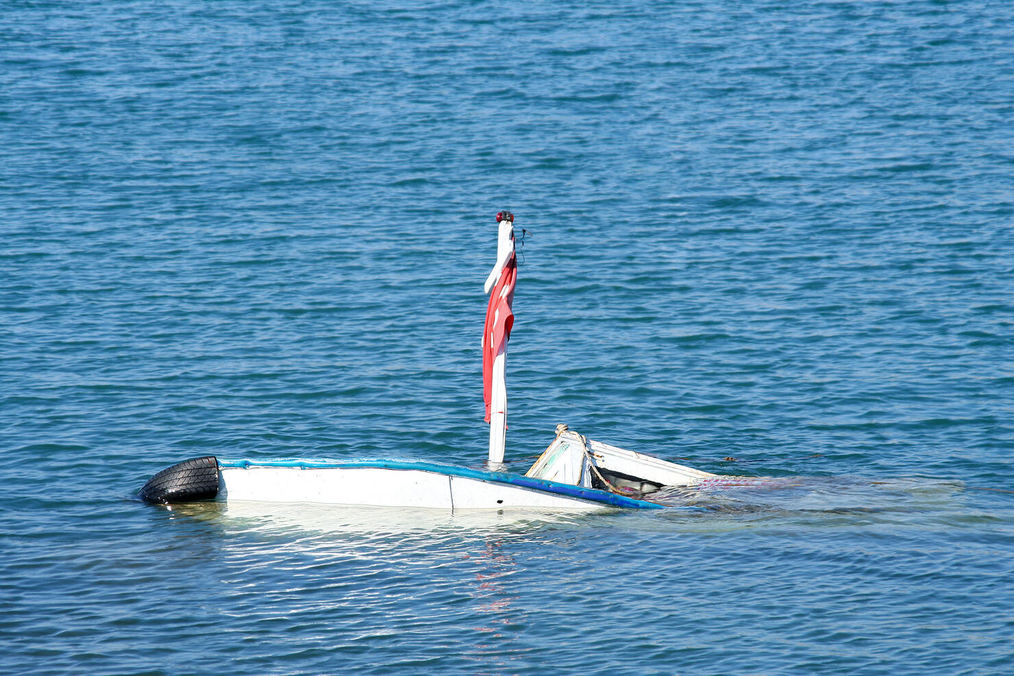 Two Sinking Boats