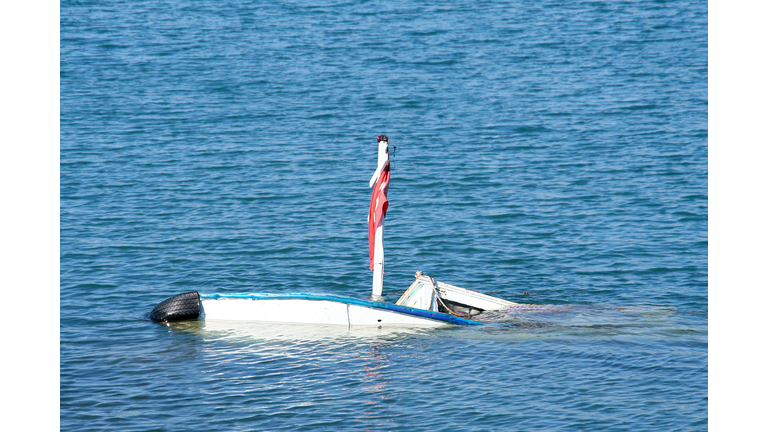 Two Sinking Boats