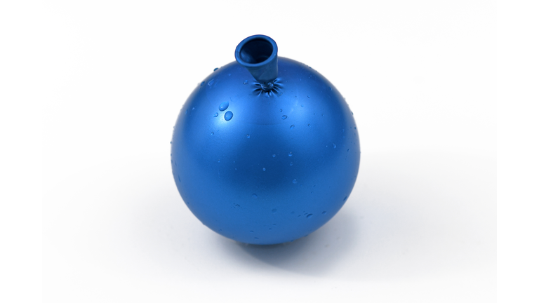 Small blue water bomb, balloon filled with water, isolated on white background