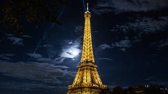 French Athlete Climbs 686 Steps to 2nd Floor of Eiffel Tower... On a Bike!