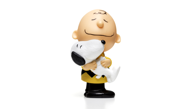 Charlie Brown hugging snoopy Happy Meal toy