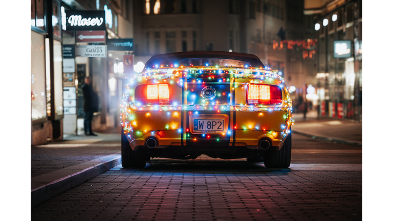 Christmas decorated sports car Ford Mustang