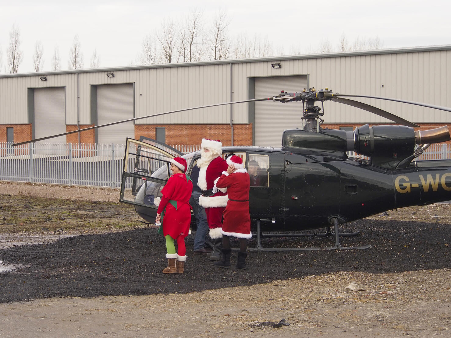 Santa arrives by helicopter at Avant garden centre.