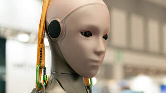 Humanoid Robots At Tech Expo Were Just Two People In Unconvincing Outfits