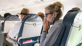 Doctor Reveals Best Airplane Seat To Avoid Getting Sick During The Holidays