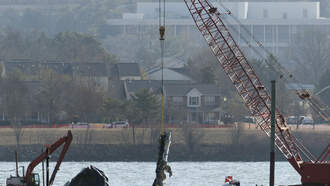 U.S. admits liability in collision with AA jet that killed 67 people