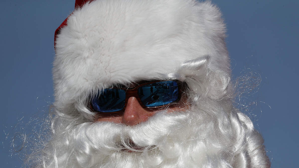 Florida AG Commissioner Cuts Red Tape for Man in Red Suit