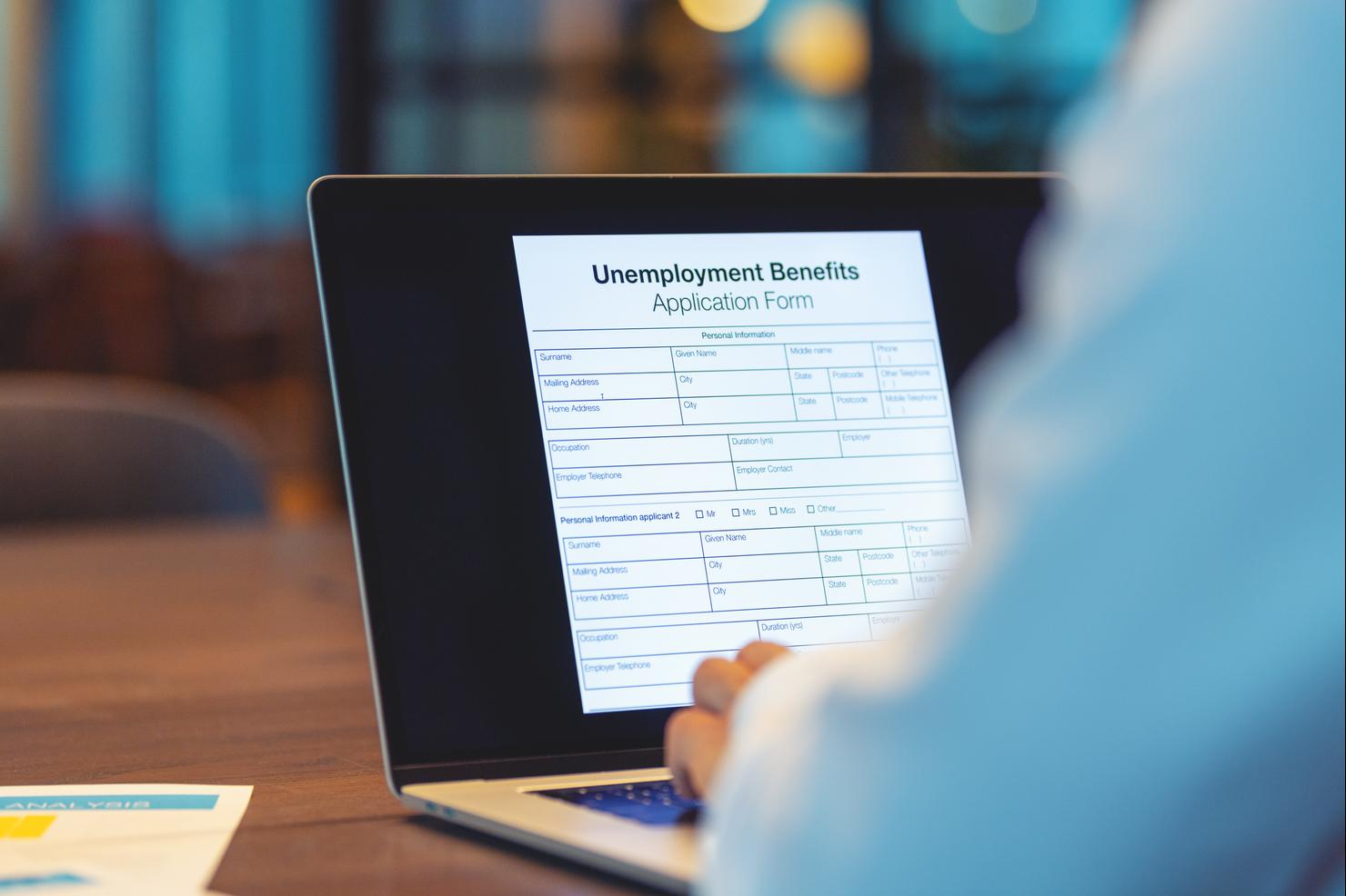 Businessman applying for unemployment benefits