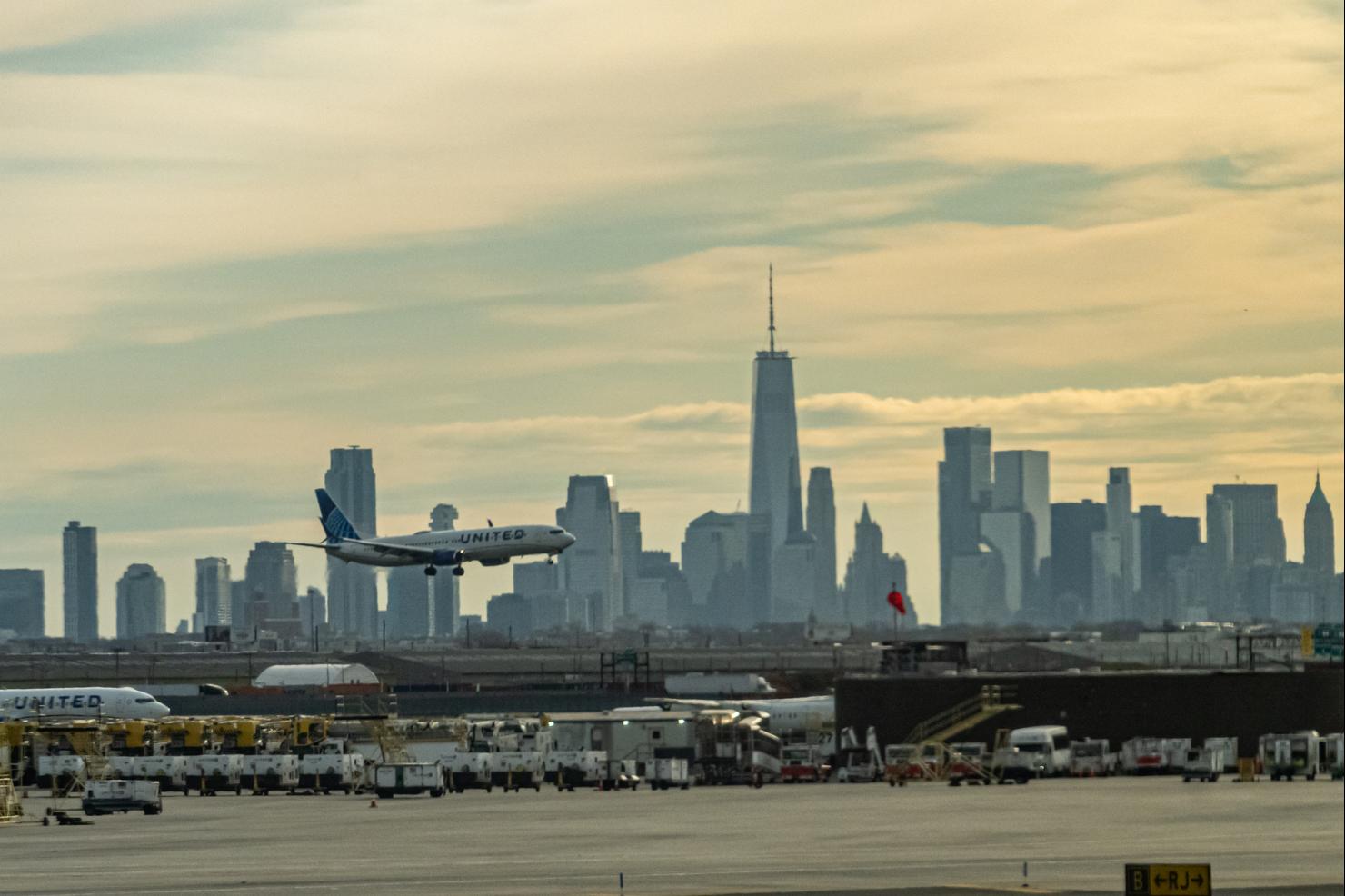 A United Airlines Jet lands at Newark Liberty Airport