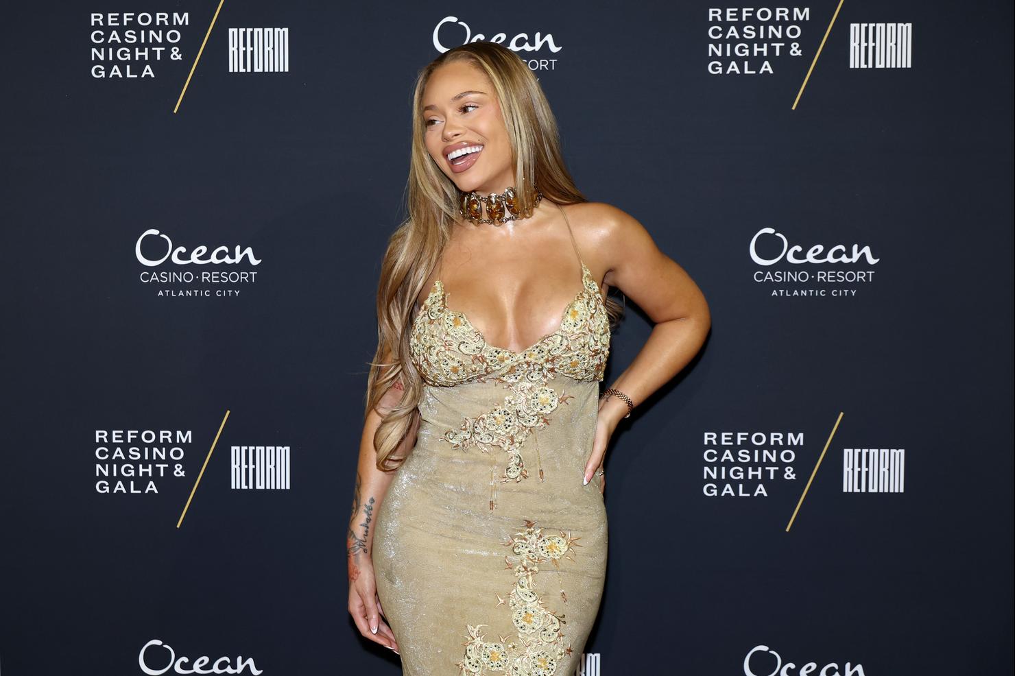 Latto Hints She's Welcomed Her First Baby In Video Reveal: Watch | iHeart