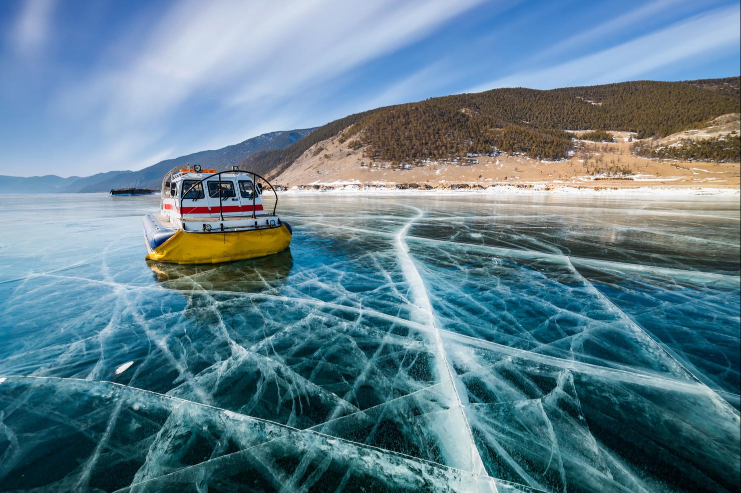 Hovercraft on ice near the island at Baikal in winter. Siberia, Russia
