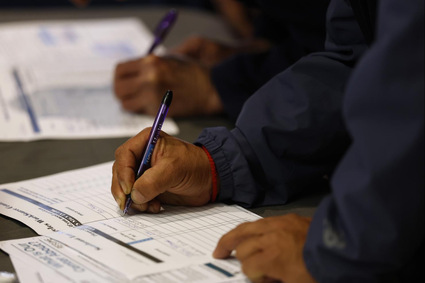People Seek Work At A Job Fair In California