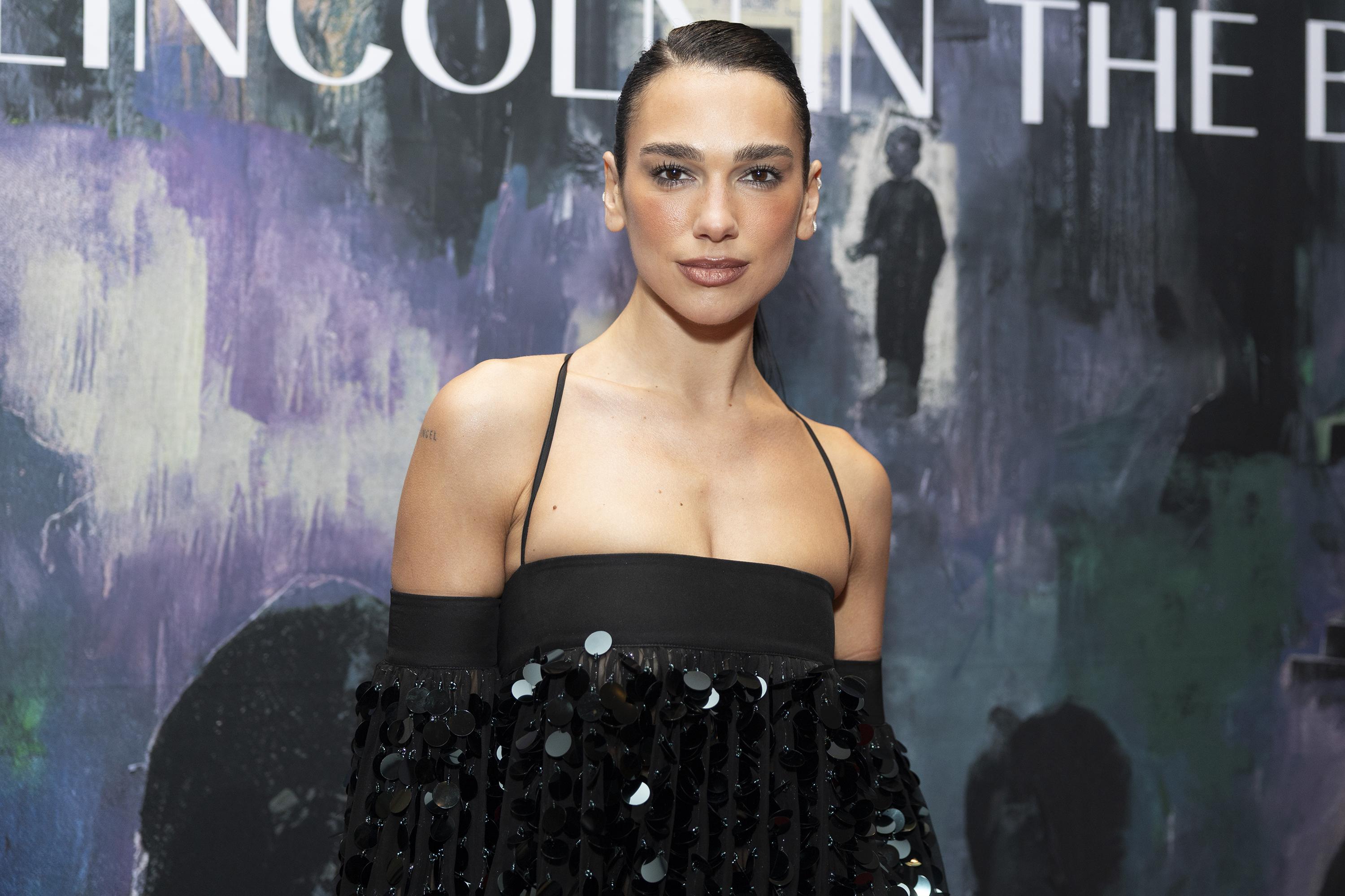 Dua Lipa Turns Heads In Lace-Up Knee-High Boots At London Literature ...
