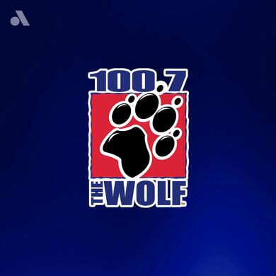 100.7 The Wolf logo