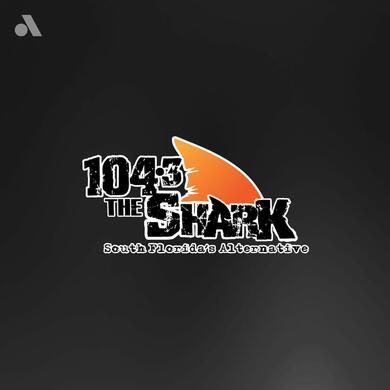 104.3 The Shark logo