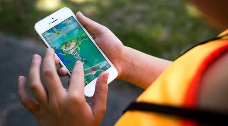 PORTLAND, ME - JULY 11: Kaelyn Kespert, 10, of Scarborough, plays Pokemon Go at Deering Oaks Park. (Photo by Brianna Soukup/Staff Photographer)