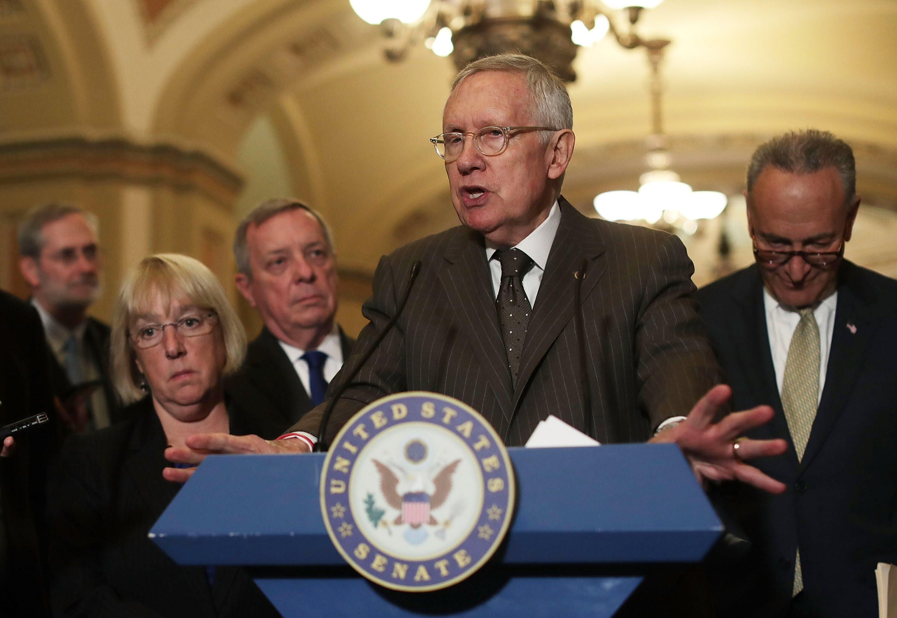 WASHINGTON, DC - JULY 12:  U.S. Senate Minority Leader Sen. Harry Reid (D-NV) (3rd L) speaks as Minority Whip Sen. Richard Durbin (D-IL) (2nd L), Sen. Charles Schumer (D-NY) (R) and Sen. Patty Murray (D-WA) (L) listen during a news briefing after the Democratic weekly policy luncheon July 12, 2016 at the Capitol in Washington, DC. Senate Democrats held a weekly policy luncheon to discuss Democratic agenda. (Photo by Alex Wong/Getty Images)