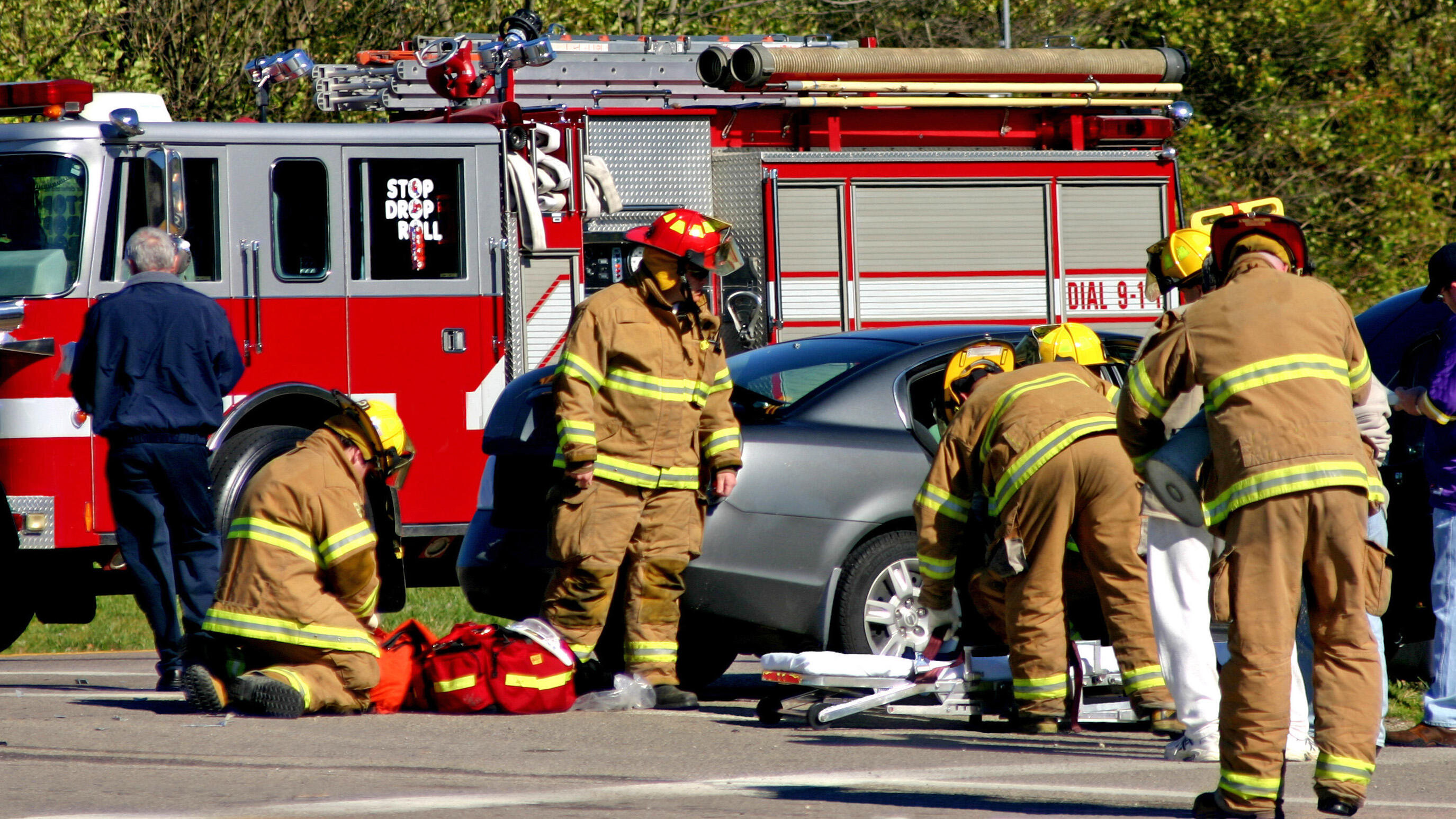 Fire Fighters at Work on the Scene of Accident