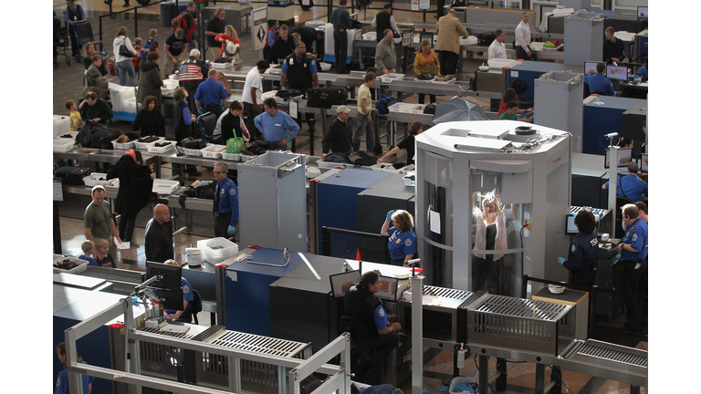 TSA Screens Passengers At Denver International Airport