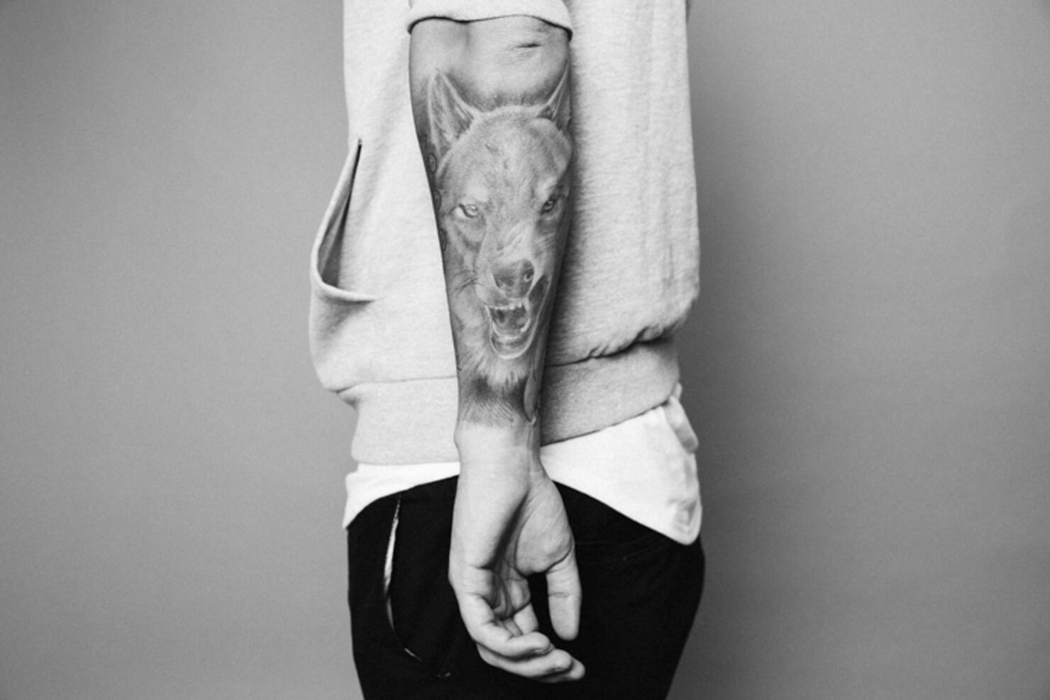 Wolf Tattoo on Kane Brown's Left Forearm