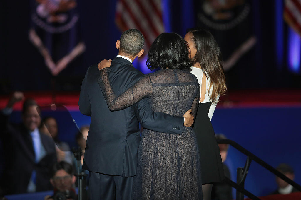CHICAGO, IL - JANUARY 10:  President Barack Obama embraces his wife Michelle and daughter Malia following his farewell speech to the nation on January 10, 2017 in Chicago, Illinois. President-elect Donald Trump will be sworn in the as the 45th president on January 20.  (Photo by Scott Olson/Getty Images)