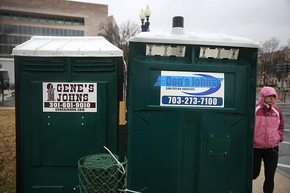 WASHINGTON, DC - JANUARY 14:  Portable restrooms near the U.S. Capitol building are seen with the companies name Don's Johns taped over to block the words next to Gene's Johns that were not taped over on January 14, 2017 in Washington, DC. Workers had been placing blue tape over the brand name on many of the portable restrooms installed near the Capitol for the inauguration.  (Photo by Joe Raedle/Getty Images)