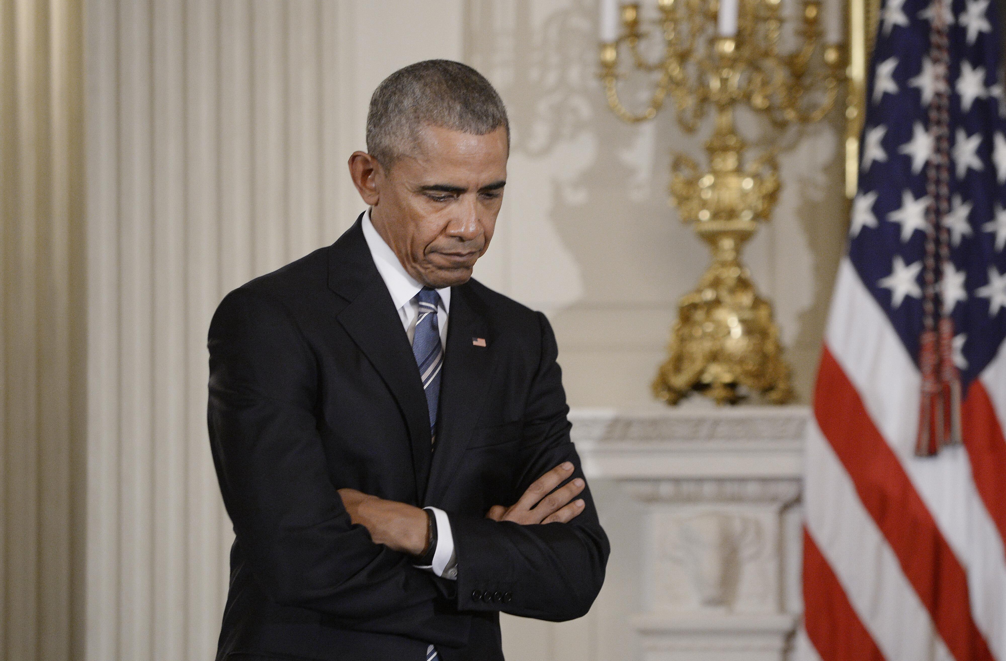 WASHINGTON, DC - JANUARY 12:  (AFP OUT) U.S. President Barack Obama listens to Vice-President Joe Biden after he presented the Medal of Freedom to him during an event in the State Dining room of the White House, January 12, 2017 in Washington, DC. (Photo 