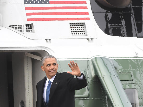 Former President Barack Obama waves as boards a helicopter to depart the US Capitol after inauguration ceremonies at the US Capitol in Washington, DC, on January 20, 2017. / AFP / JIM WATSON        (Photo credit should read JIM WATSON/AFP/Getty Images)