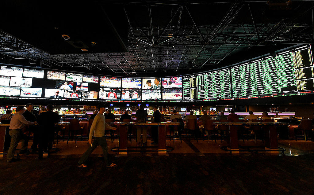 LAS VEGAS, NV - FEBRUARY 02:  The betting line and some of the nearly 400 proposition bets for Super Bowl 50 between the Carolina Panthers and the Denver Broncos are displayed at the Race & Sports SuperBook at the Westgate Las Vegas Resort & Casino on February 2, 2016 in Las Vegas, Nevada. The newly renovated sports book has the world's largest indoor LED video wall with 4,488 square feet of HD video screens measuring 240 feet wide and 20 feet tall.  (Photo by Ethan Miller/Getty Images)