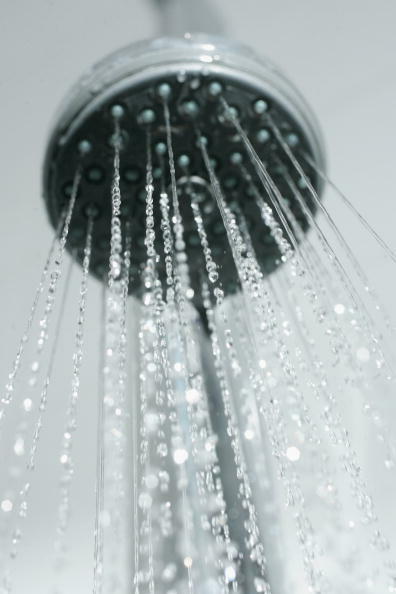 BERLIN - JANUARY 12:  Water flows from a bathroom shower head January 12, 2007 in Berlin, Germany.  (Photo Illustration by Sean Gallup/Getty Images)