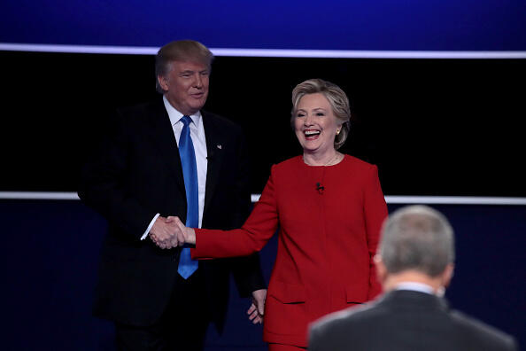 HEMPSTEAD, NY - SEPTEMBER 26:  (L-R) Republican presidential nominee Donald Trump and Democratic presidential nominee Hillary Clinton shake hands after the Presidential Debate at Hofstra University on September 26, 2016 in Hempstead, New York.  The first of four debates for the 2016 Election, three Presidential and one Vice Presidential, is moderated by NBC's Lester Holt.  (Photo by Drew Angerer/Getty Images)
