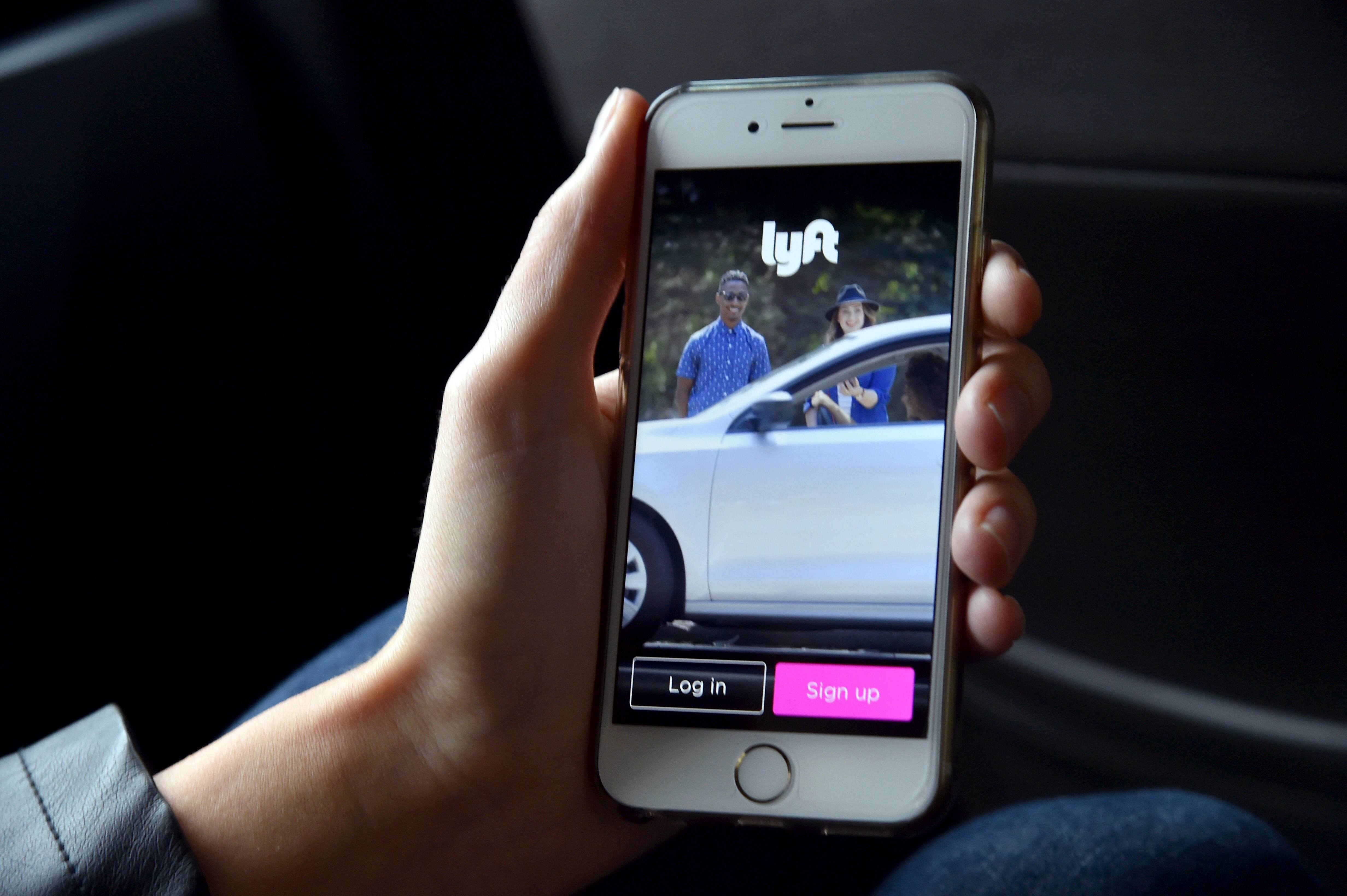 SAN FRANCISCO, CA - FEBRUARY 03:  The Lyft app is seen on a passenger's phone on February 3, 2016 in San Francisco, California.  (Photo by Mike Coppola/Getty Images for Lyft)