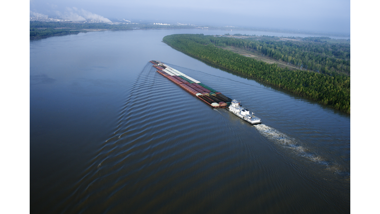 Aerial of barge on Mississippi River in Baton Rouge, Louisiana.