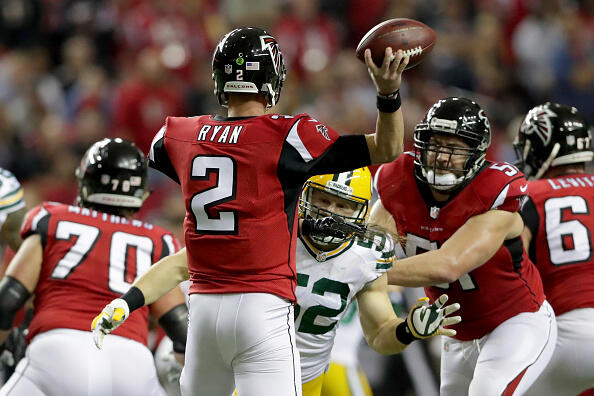 ATLANTA, GA - JANUARY 22:  Matt Ryan #2 of the Atlanta Falcons looks to pass in the first quarter under pressure by  Clay Matthews #52 of the Green Bay Packers in the NFC Championship Game at the Georgia Dome on January 22, 2017 in Atlanta, Georgia.  (Photo by Streeter Lecka/Getty Images)
