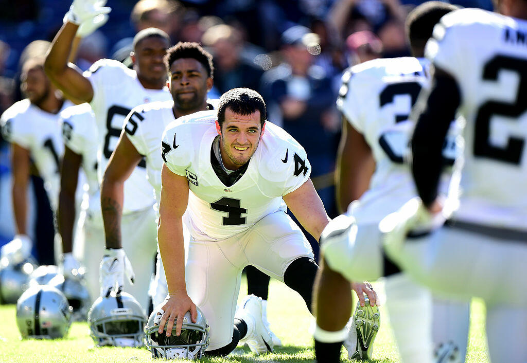 SAN DIEGO, CA - DECEMBER 18:  Derek Carr #4 of the Oakland Raiders  warms up before the game against the San Diego Chargers at Qualcomm Stadium on December 18, 2016 in San Diego, California.  (Photo by Harry How/Getty Images)