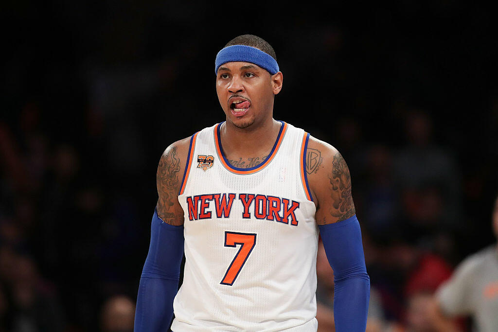NEW YORK, NY - DECEMBER 04:  Carmelo Anthony #7 of the New York Knicks reacts against the Sacramento Kings during the second half at Madison Square Garden on December 4, 2016 in New York City. NOTE TO USER: User expressly acknowledges and agrees that, by downloading and or using this photograph, User is consenting to the terms and conditions of the Getty Images License Agreement.  (Photo by Michael Reaves/Getty Images)