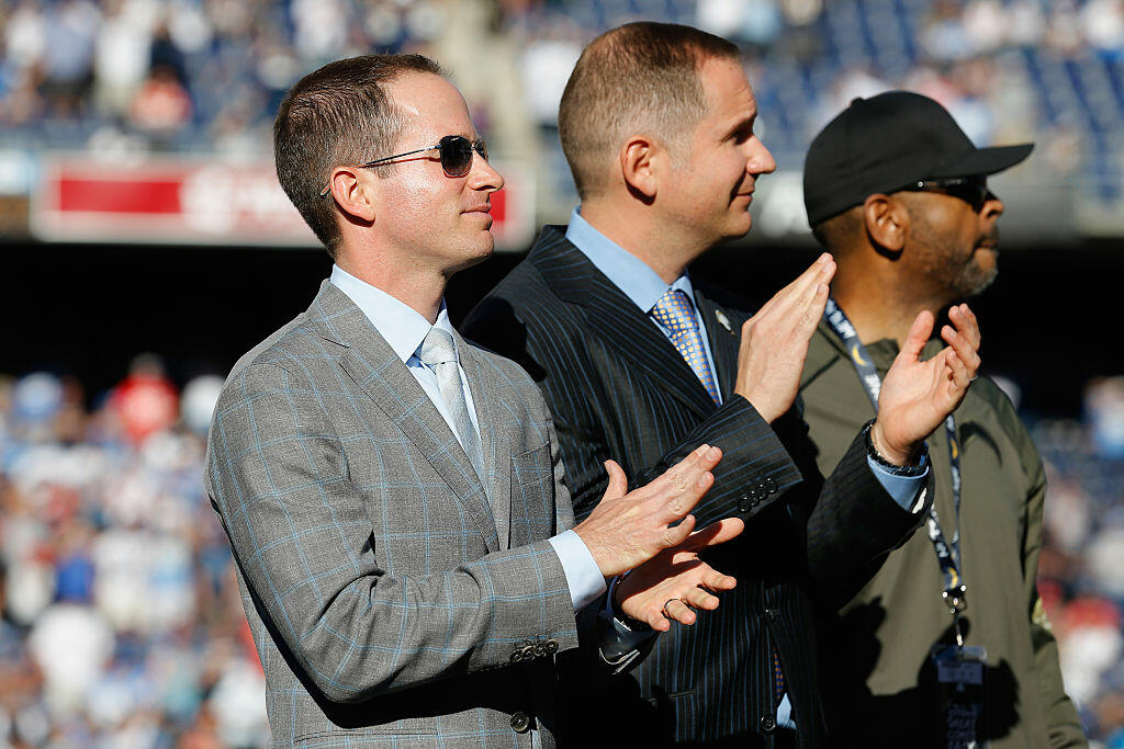 SAN DIEGO, CA - NOVEMBER 22: John Spanos  (grey suit) President of Football Operations for the San Diego Chargers looks on with A.G. Spanos President of Business Operations for the San Diego Chargers during halftime of a game against the Kansas City Chiefs at Qualcomm Stadium on November 22, 2015 in San Diego, California. (Photo by Sean M. Haffey/Getty Images)